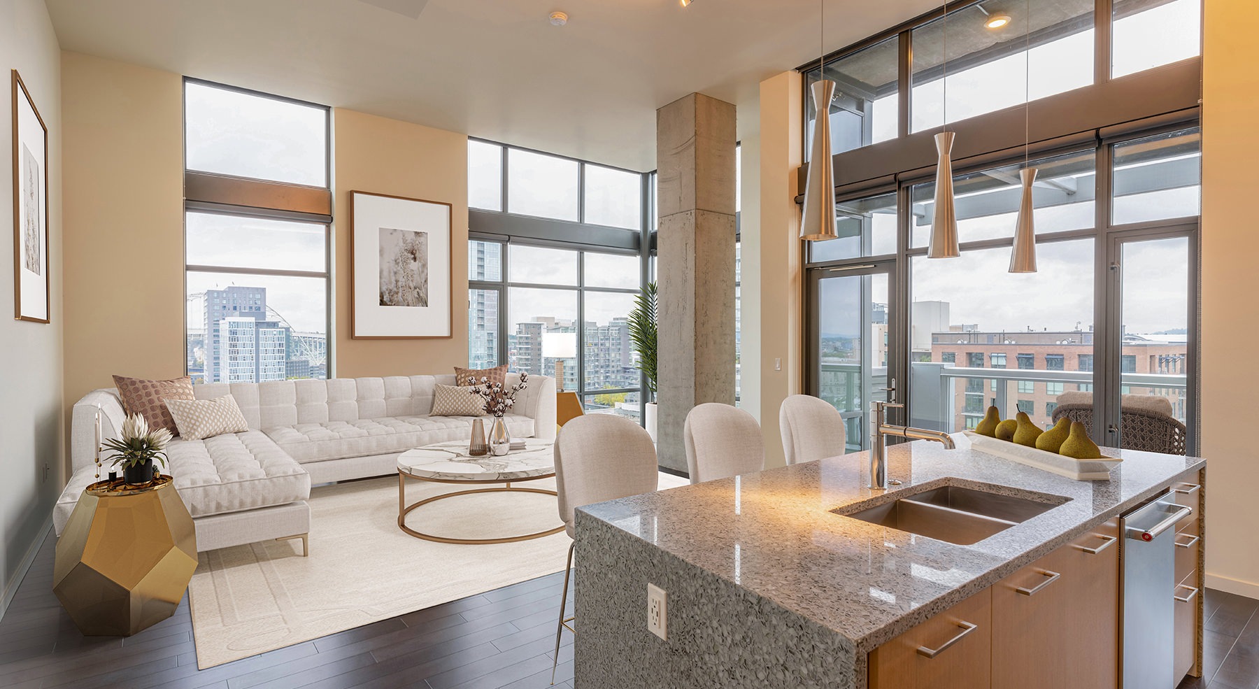 Spacious kitchen with large windows and wood floors