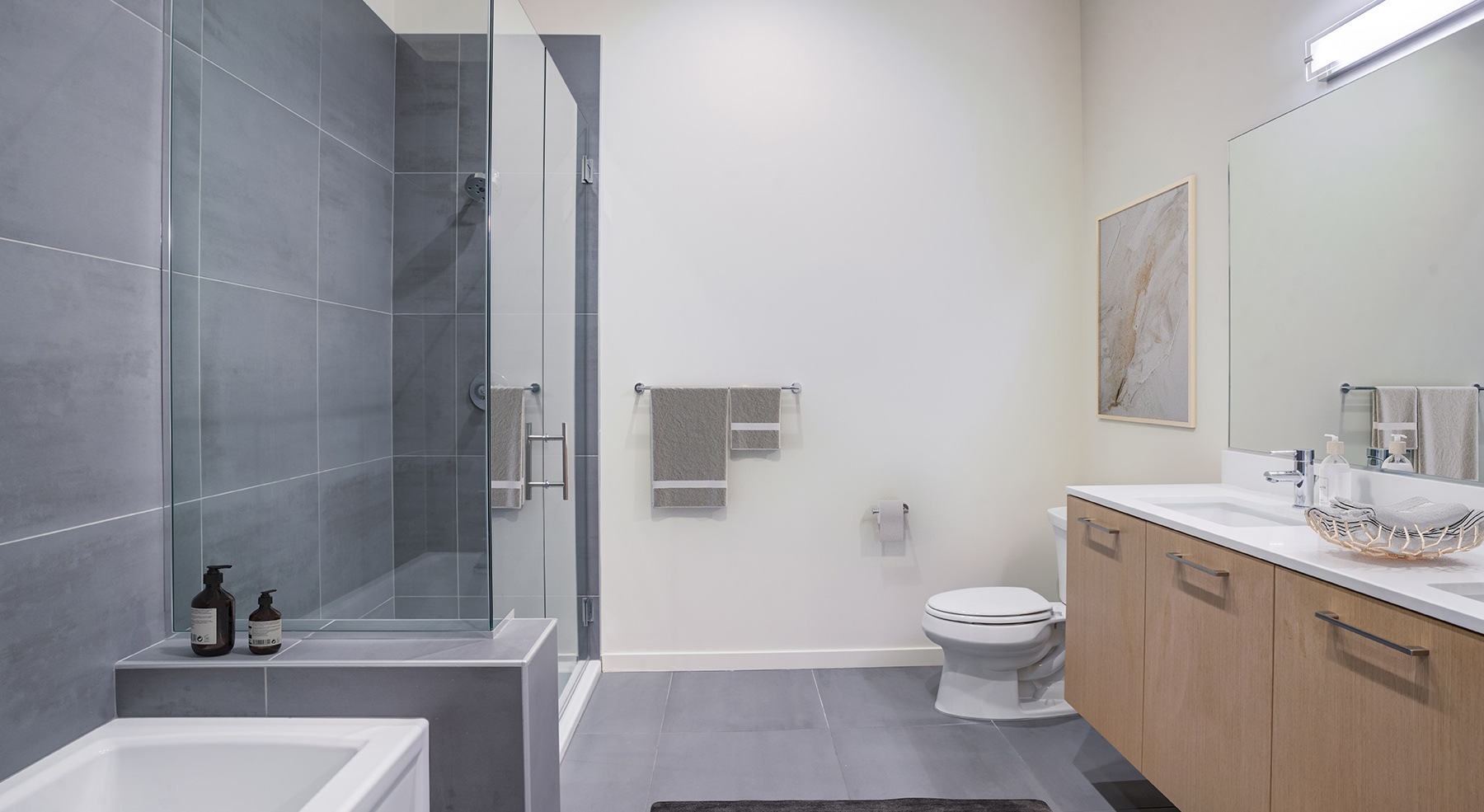 Spacious batheoom with large mirror