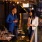 Couple standing outside a restaurant at night 